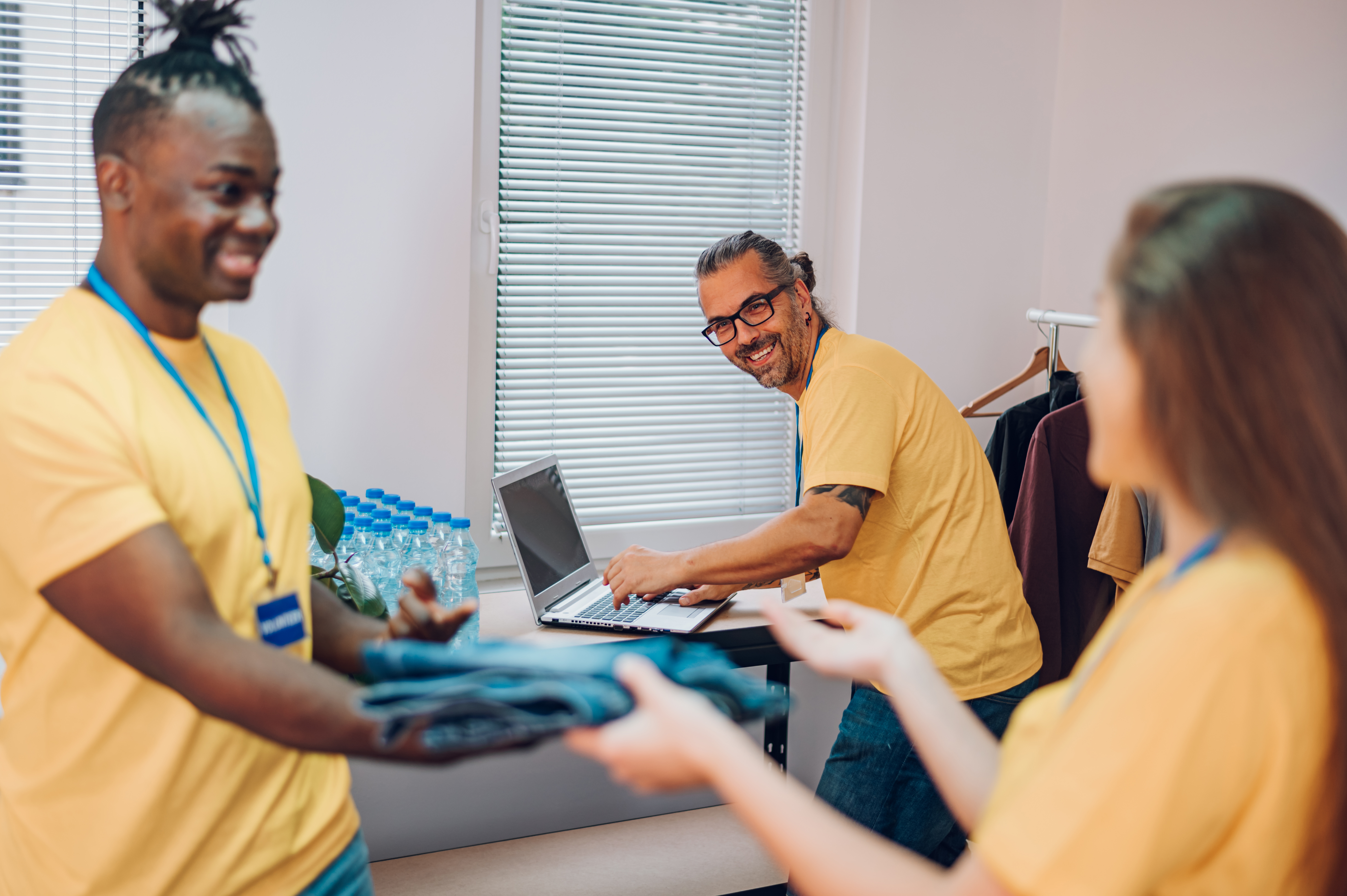 Group of multiracial volunteers working in community charity don